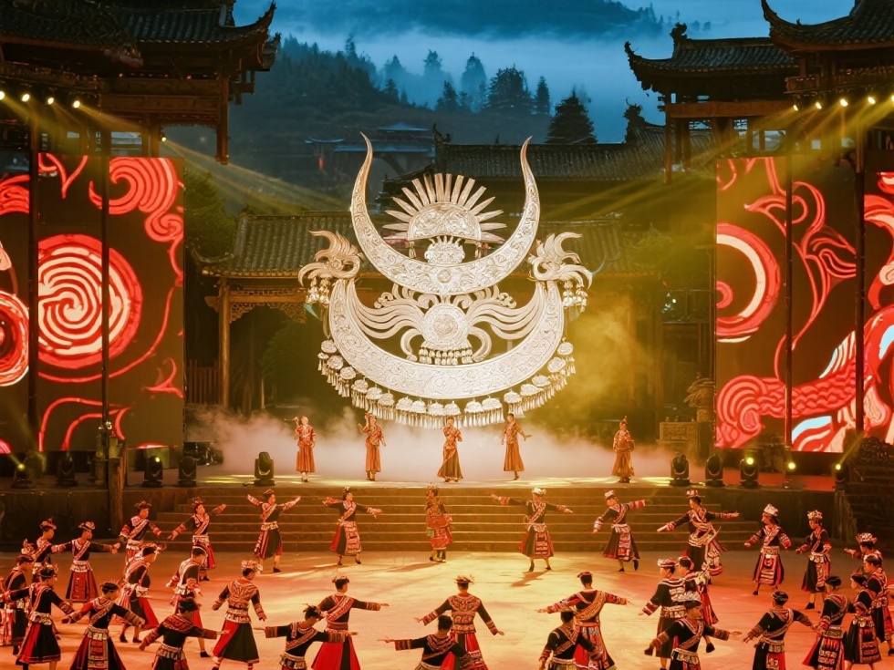 jimeng-2025-07-04-9276-湘西千古情实景演出，土家族摆手舞方阵，舞台中央巨型银饰图腾，背后天门山云雾缭绕，....jpeg